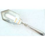 A silver fish slice with rib decorated filled handle