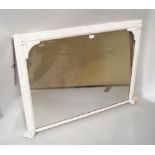 A Victorian rectangular over mantle mirror, later painted white,
