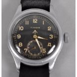 A WWII "Dirty Dozen" white metal wristwatch.