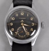 A WWII "Dirty Dozen" white metal wristwatch.