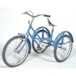 A vintage child's tricycle, the blue painted frame with vinyl seat,