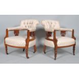 Two Victorian tub armchairs, mid-19th century, with button backs,