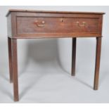 A George III oak rectangular side table, with a long drawer,