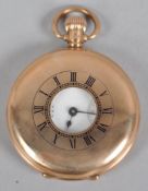 A Waltham demi hunter pocket watch. Circular white dal with numerical markings.