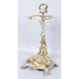 An antique style brass stick stand, embellishments with hunting scene,