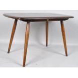 An Ercol coffee table in dark wood, height 45cm, width 72cm, depth 44.
