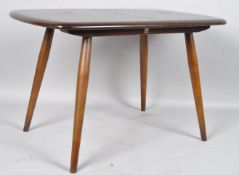 An Ercol coffee table in dark wood, height 45cm, width 72cm, depth 44.