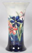 A Moorcroft pottery "Spring Flower" pattern tube lined vase of waisted form,