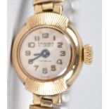 A yellow gold Excalibur wristwatch. 21 Jewel manual wind movement.