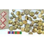 A collection of fifty military buttons,