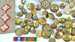 A collection of fifty military buttons,