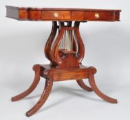 A mahogany lyre style sofa table, in the Regency style,