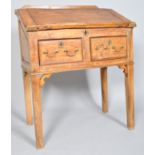 An 18th century pine clerk's desk,