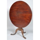 A George III mahogany breakfast/supper table, circa 1780, on a reeded baluster carved stem,