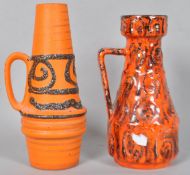 West German pottery 1960's vases/jugs, both in orange with textured fat lava glazes,