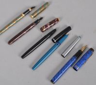 A Mont Blanc Monte Rosa fountain pen with steel cap and four others pens