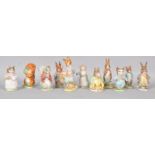 A collection of eleven Beswick Beatrix Potter figures