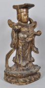 A Chinese carved wood and painted figure of an immortal, on double lotus base,