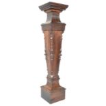 An oak pedestal, made from timbers salvaged from H M S Foudroyant, Nelson's flagship, circa 1900,