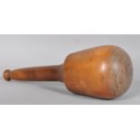 A 19th century fruitwood loom weight with turned tapering handle and knoop finial,