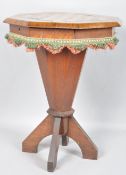 A late 19th century marquetry inlaid oak sewing table, of octagonal form,