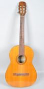 A Spanish Giannini GN-70 acoustic guitar with geometric marquetry inlay,