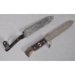 A Hitler Youth dagger with scabbard, unmarked blade, H J diamond glued in place,