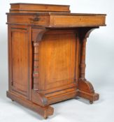 A Victorian oak Davenport,