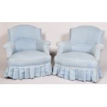 A pair of Victorian tub shaped armchairs,