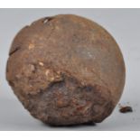 A cannon ball, unearthed on Hastings beach,