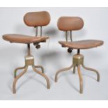 Two vintage Everlaut adjustable chairs, on tubular base,