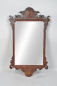 A George III style mahogany wall mirror,