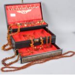 A large jewellery case having six individual large beaded necklaces having gross weight of 321.