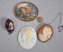 A collection of jewellery to include: A cameo brooch; A crystal portrait brooch etc