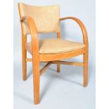 A late 1940's/early 1950's elbow chair with oak bent wood arms,