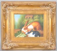 20th century school, Two rabbits, oil on canvas, in gilt frame,