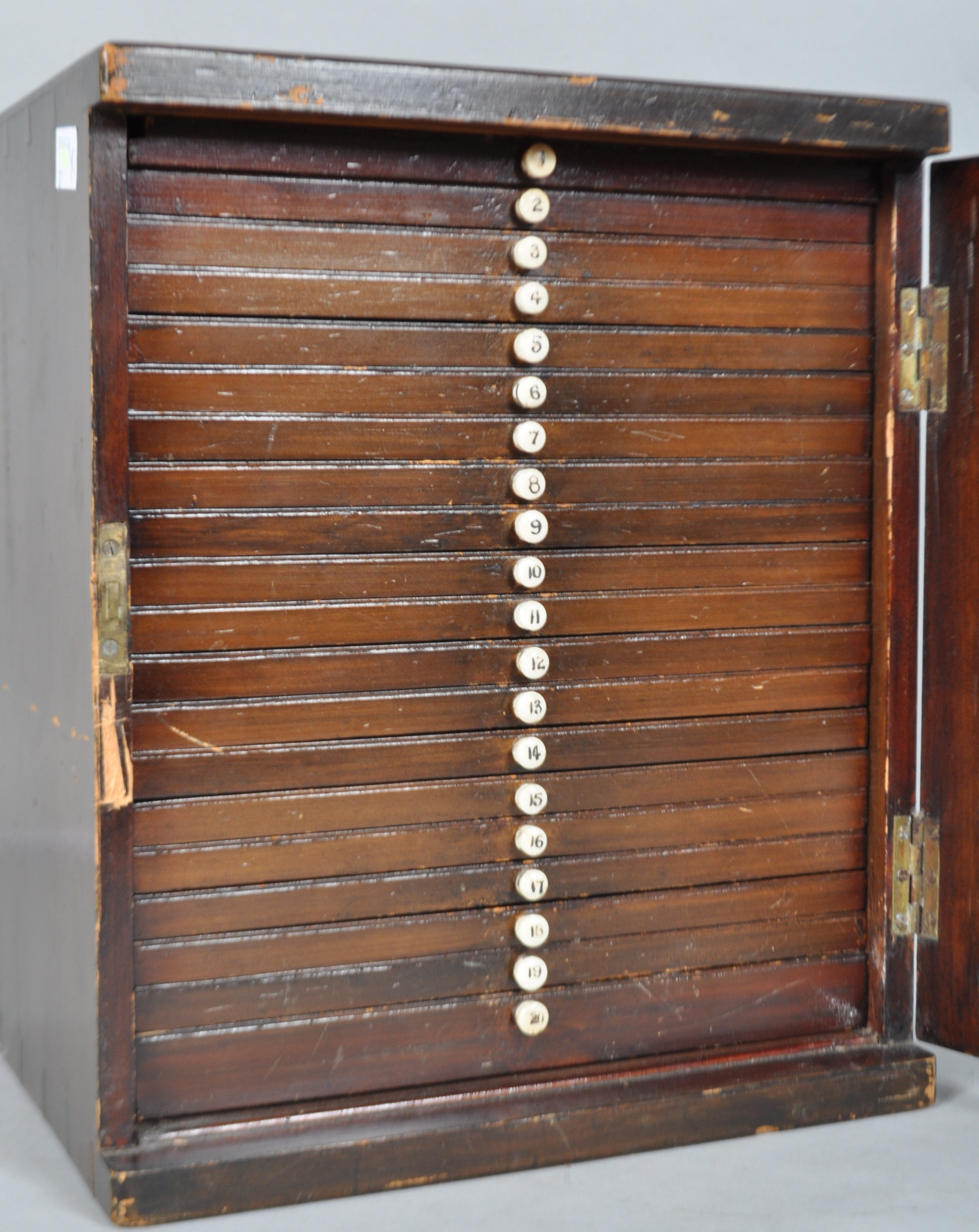 An Edwardian mahogany collectors cabinet, the glazed door enclosing twenty numbered drawers, - Image 2 of 3