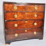 A George III mahogany chest of two short and three long graduated drawers,