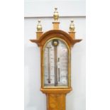 A walnut and brass stick barometer by O Comitti Holburn, 20th century,