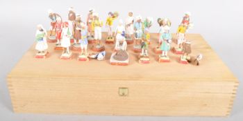 A group of Colonial Indian composition and terracotta polychrome figures, mid-20th century,