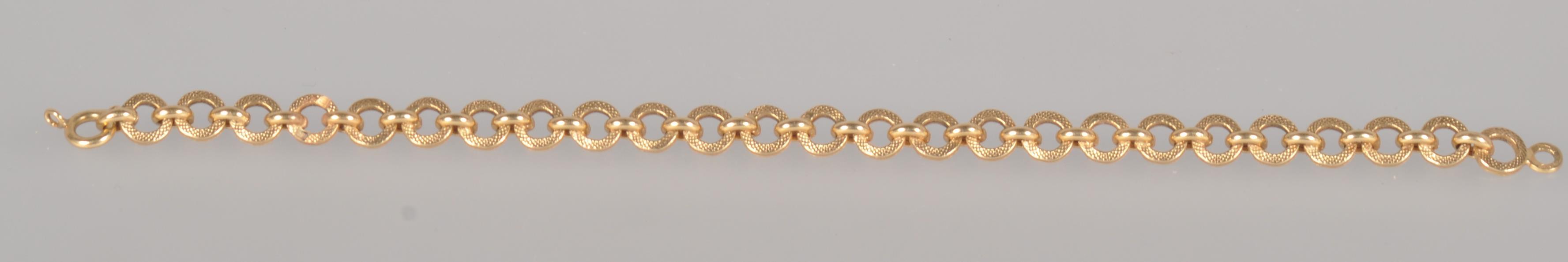 A yellow metal linked bracelet, 6 ½ inch length, bolt ring clasp.