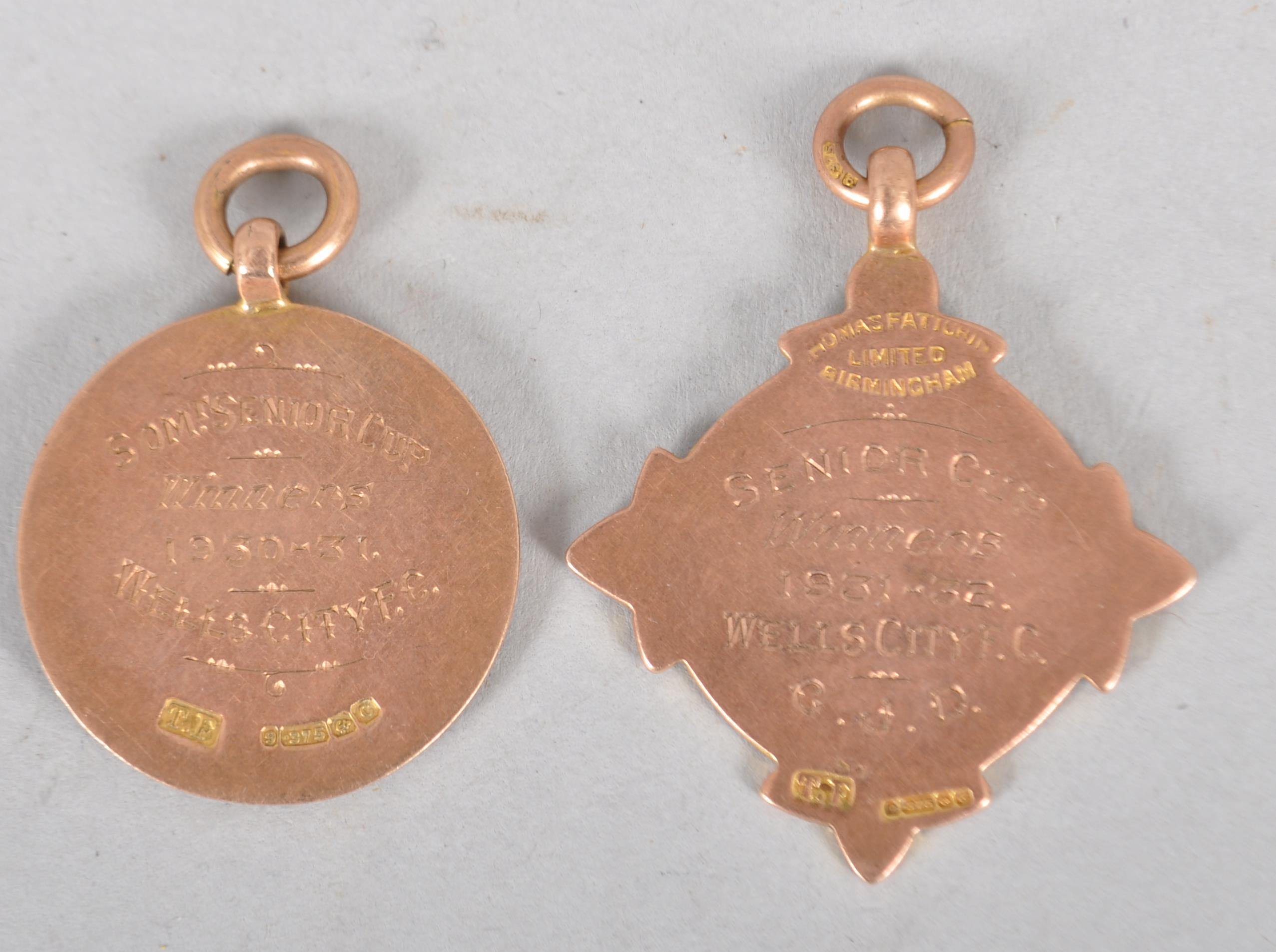 A group of two 9ct gold football prize fobs of round and starred form - Image 2 of 2