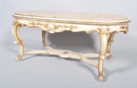 A Louis XV style parcel-gilt carved wood and marble oval sofa table, 20th century,