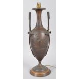An Aesthetic movement bronzed pewter lamp base, late 19th century/circa 1900,
