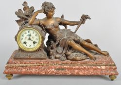 A French late 19th century gilt metal and marble mounted mantle clock,