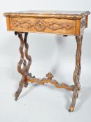 A mid Victorian burr walnut dressing-work table, of serpentine outline,