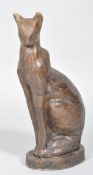 A composite and resin sculpture of a Siamese cat,