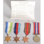 Four Second World War medals, comprising : The 1935-49 Star; The Atlantic Star; The Burma Star,