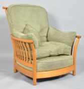 An Ercol Renaissance Golden Dawn armchair, with high back,