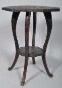 An early 20th century Japanese carved hardwood occasional table,
